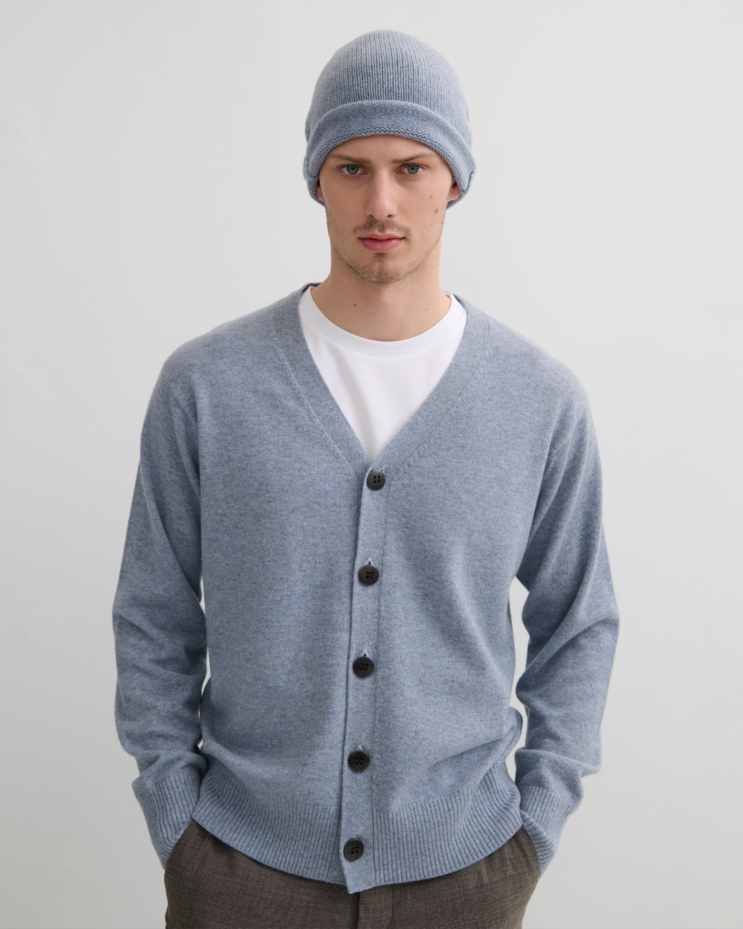 Unisex Misty Blue 100% Cashmere Beanie with Rolled Edge paired with Men's cashmere v neck cardigan
