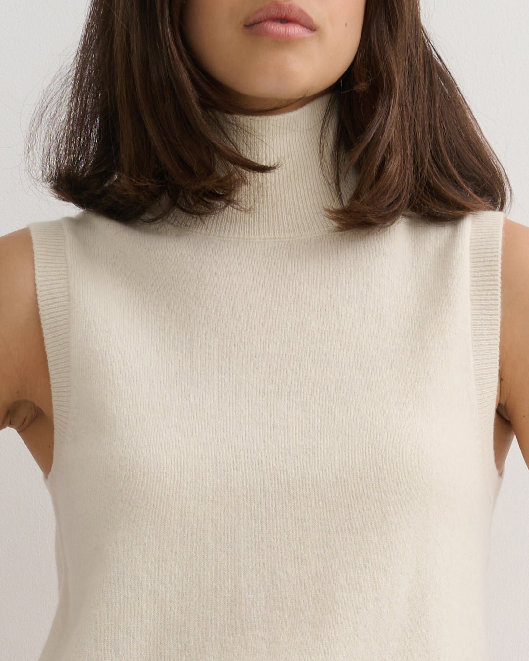 CASHMERE MOCK NECK SLEEVELESS TOP - CREAM RAW